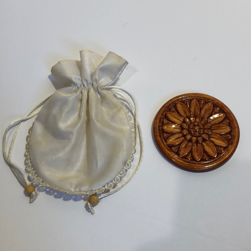 Hand-carved wood purse mirror with cloth case